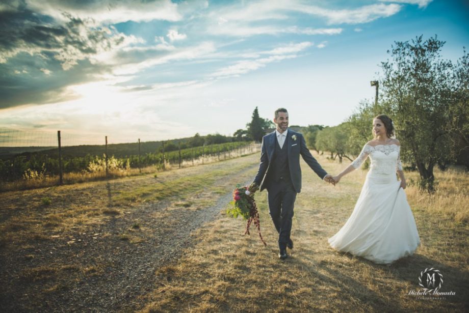 married couple walking in the beautiful Tuscan countryside