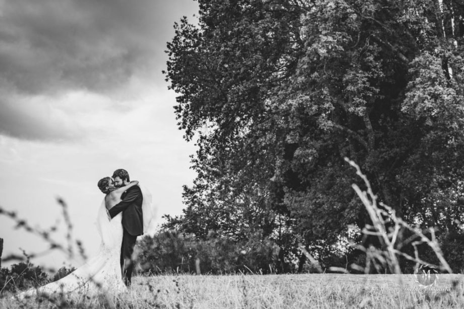 bride and groom together on their wedding day in tuscany